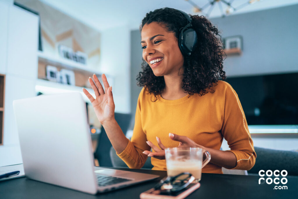 An image depicting a customer service agent working from home