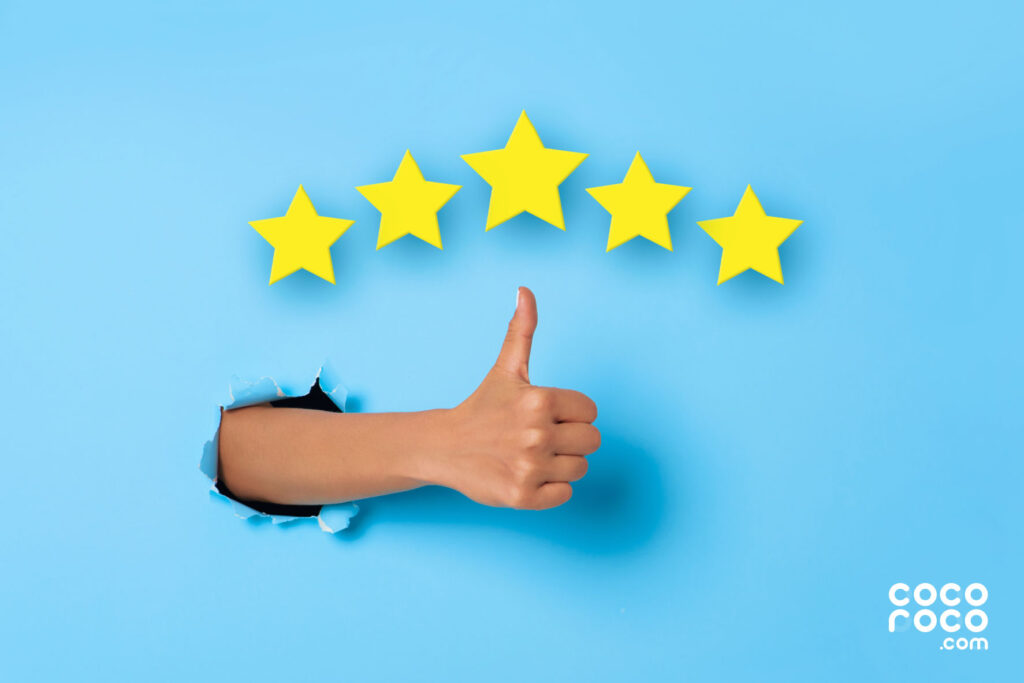 An image depicting a hands with a thumb up and a 5-star review